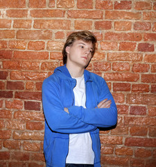 Attractive teenage boy in urban background