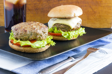 Homemade hamburger on dark plate