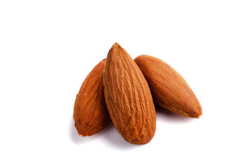 almonds nuts close up on white background isolate