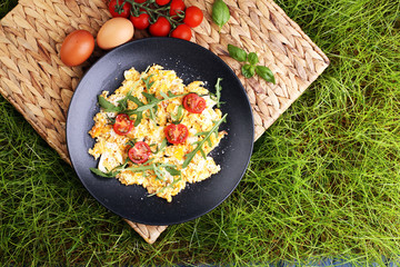 Traditional breakfast - fried eggs,ruccola, tommato- - diet concept scrambled eggs