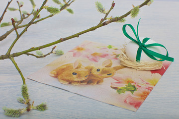 White eggs lined up on a white wooden background