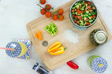 Salad ingredients on a kitchen board