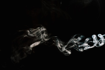 white smoke on black background.