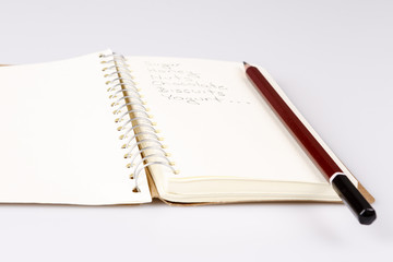 shopping list in the diary with pencil
