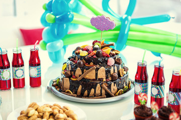 Candy Bar. Delicious sweet buffet with cupcakes. Sweet holiday buffet with cupcakes and other desserts.Table with sweets, candies, dessert,happy birthday concept