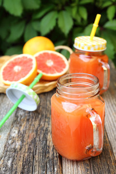 Grapefruit juice in glass jar