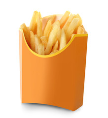 Carton box with delicious French fries on white background