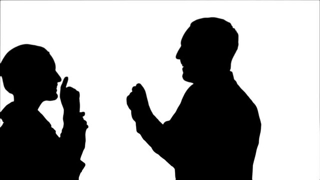 Silhouette Happy people casual dressed enjoying dancing together.