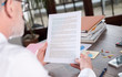 businessman checking a document