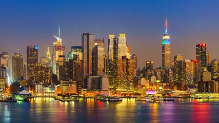 Poster View on Manhattan at night, New York, USA © sborisov
