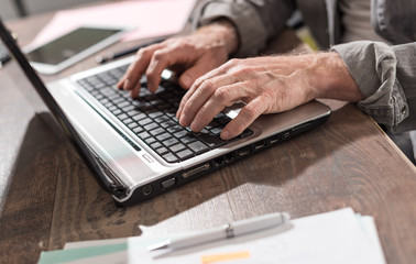 Businessman working on laptop