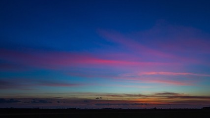 Beautiful vibrant sky over fields in Poland