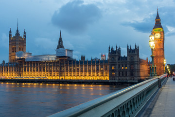 Fototapeta premium LONDON, ENGLAND - JUNE 16 2016: Night photo of Houses of Parliament with Big Ben from Westminster bridge, London, England, Great Britain