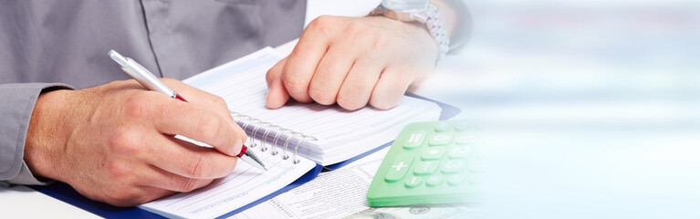 Accountant hands with calculator