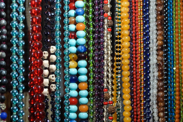 Glass and stone beads on the market