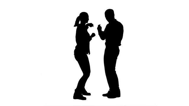 Silhouette Young couple dancing together.