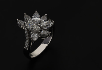 Diamond ring on black background