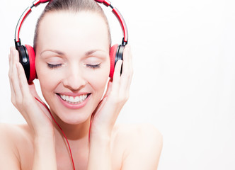 Happy girl listening to music.