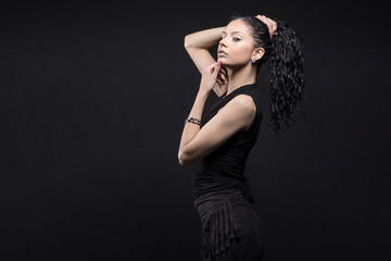 Young beautiful girl with curly hair.