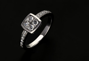 Diamond ring on black background