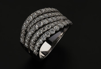 Diamond ring on black background