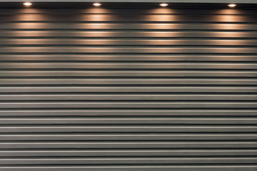 The shutter door with the light from spotlight