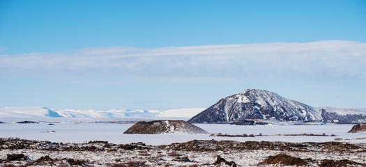 Fototapeta na wymiar Panoramic landscape, frozen lagoon with mountain in winter