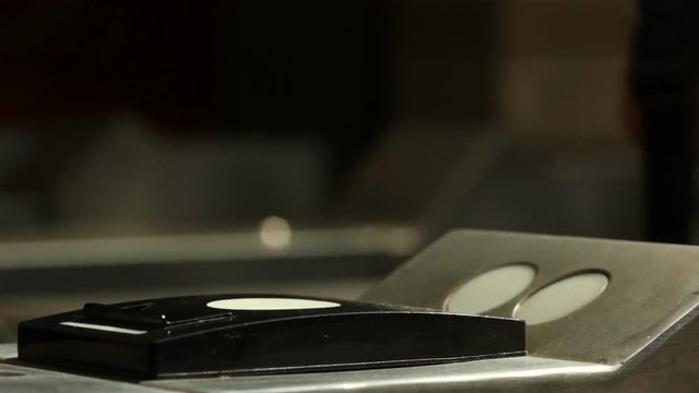 Closeup Hand Put the Phone to Ntfs System in Metro for Payment