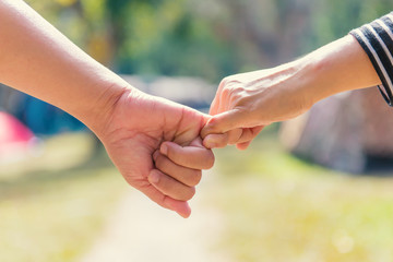 Happy couple holding hands together as forever love in Valentine day