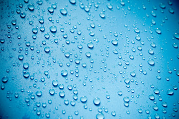 Water drops on blue background.