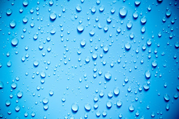 Water drops on blue background.