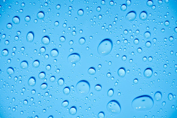 Water drops on blue background.