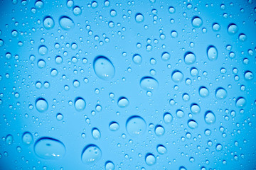 Water drops on blue background.