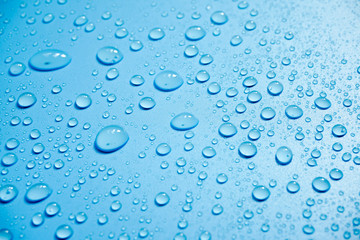 Water drops on blue background.
