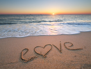 Love on the sea sand.
