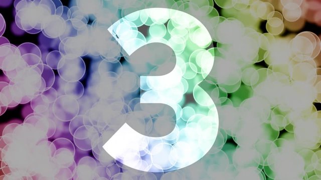 Three to four years birthday fade in/out animation with color gradient moving bokeh background. Animation: 90 frames still with number, 180 fade out, 30 clear, 180 fade in, 300 still.