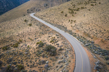 Winding road through the mountains of California's Mojave Desert.