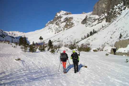 Trekkers in Veľka Studená valley in High Tatras, Slovakia