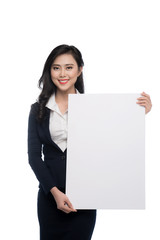 Young asian business woman showing a white board isolated on white background.