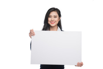 Young asian business woman showing a white board isolated on white background.