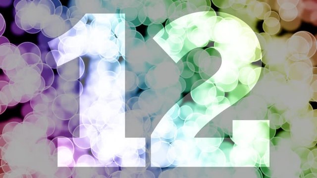 Twelve to thirteen years birthday fade in/out animation with color gradient moving bokeh background. Animation: 90 frames still with number, 180 fade out, 30 clear, 180 fade in, 300 still.