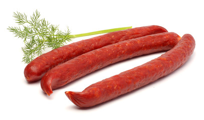 sliced red salami isolated on white background