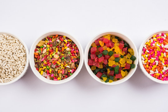 Indian traditional mouth freshener like sauf, chatpata gatagat, mixed supari, tutti frutti used in sweet Masala Paan etc served in white ceramic bowls, selective focus 