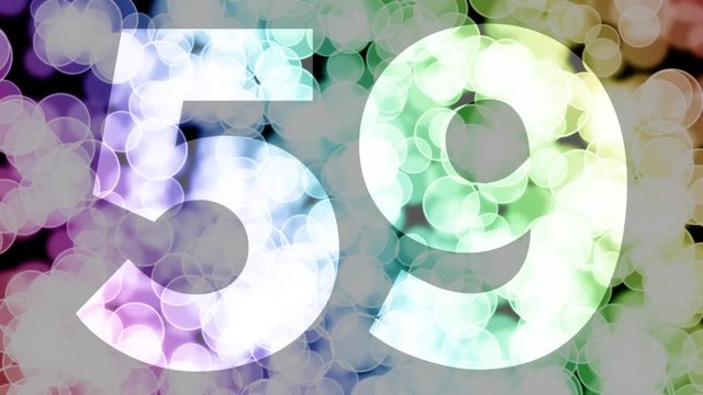Fifty nine to sixty years birthday fade in/out animation with color gradient moving bokeh background. Animation: 90 frames still with number, 180 fade out, 30 clear, 180 fade in, 300 still.