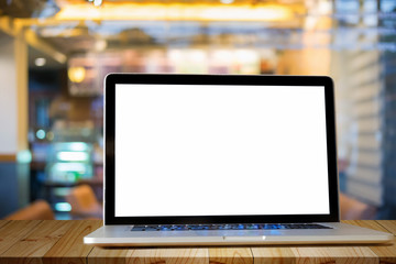 Laptop showing Blank screen on table in Cafe.