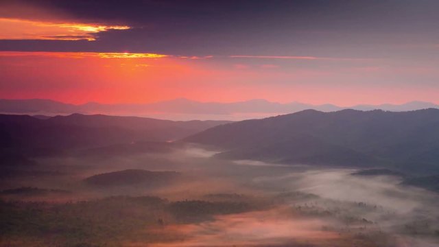 Beautiful dramatic sunrise time lapse over the Blue Ridge Mountains in Asheville North Carolina