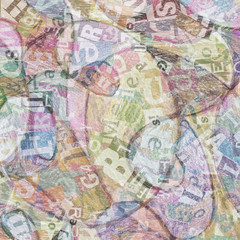 Handmade collage with mixed letter clippings from magazines and newspapers on colorful pencil colored background