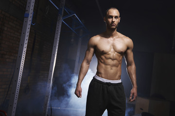 Fototapeta na wymiar Front view of motivated bodybuilder