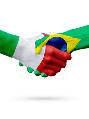 Flags Italy, Brazil countries, partnership friendship handshake concept.