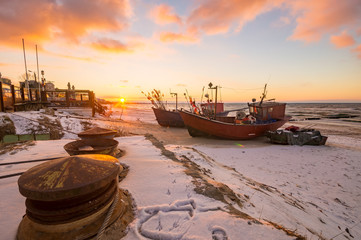 Sunset over the Baltic sea in winter, Miedzyzdroje, Baltic Sea resort in Poland